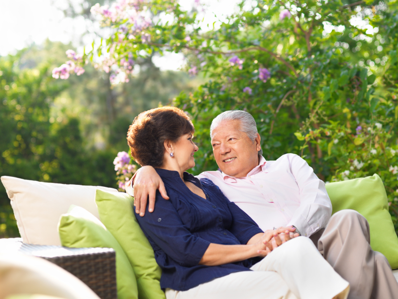 Happy couple looking good with dental bridges