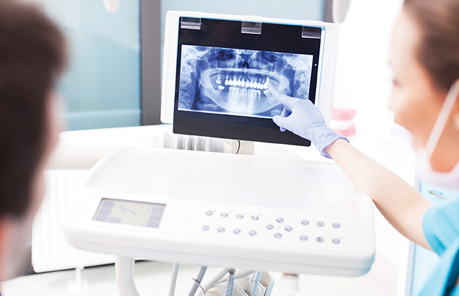 Digital X-Rays being used in a dental office